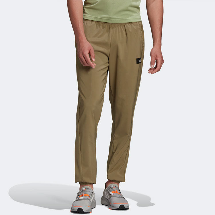 Men's adidas Solid Color Logo Label Side Pocket Bundle Feet Sports Pants/Trousers/Joggers Green H61146