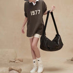Fear of God Essentials FW22 Henley Rugby Polo 'Off Black' FOG-FW22-366