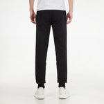 PUMA CLASSICS GRAPHICS BRAND LOVE PLACEMENT PANTS TR 533146-01