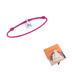 LOUIS VUITTON SiLOUIS VUITTONer Lockit Bracelet Sterling SiLOUIS VUITTONer Black Laquered And Pink Polyester Cord